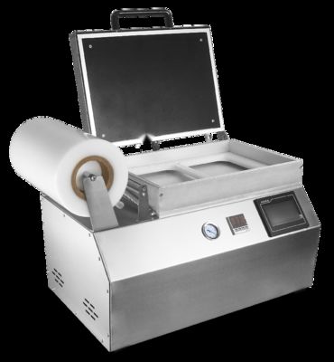 Maszyna do zgrzewania próżniowego skóry na tacy z tworzywa sztucznego, sterowana dotykowo, z ręcznym dociskiem, ze stali nierdzewnej 304 przeznaczonej do kontaktu z żywnością